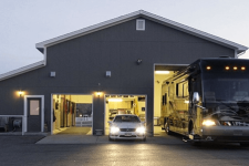 A garage with different garage door sizes to fit a car, an SUV and an RV.